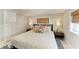 Bright bedroom featuring a comfortable bed, and a closet for ample storage at 12204 45Th Avenue W Dr, Cortez, FL 34215
