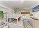 Charming bedroom with bunk beds, decor, and a mounted TV at 12204 45Th Avenue W Dr, Cortez, FL 34215