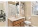 Well-lit bathroom with a vanity, mirror, and a neutral color scheme at 12211 Aster Ave, Bradenton, FL 34212