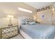 This bedroom offers neutral walls, carpet flooring, and plenty of natural light at 12211 Aster Ave, Bradenton, FL 34212