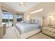 Serene main bedroom with lanai access, soft lighting, and comfortable decor near the pool area at 12211 Aster Ave, Bradenton, FL 34212