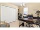 Bright home office featuring a desk, storage, and a motivational quote wall decal at 12211 Aster Ave, Bradenton, FL 34212