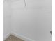 This closet features wire shelving and wood-look tile flooring at 12396 Bacchus Rd, Port Charlotte, FL 33981
