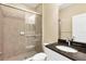 Well-lit bathroom featuring a glass-door shower and granite vanity at 12717 Deep Blue Pl, Bradenton, FL 34211