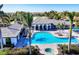 Aerial view of the community pool and amenity area featuring multiple pools and seating areas at 12717 Deep Blue Pl, Bradenton, FL 34211