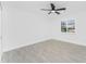 Bright bedroom with new floors, ceiling fan and plantation shutters at 130 Acalypha, Punta Gorda, FL 33955