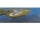 Aerial view showcases the complex near the water at 1323 Perico Point Cir # 107, Bradenton, FL 34209
