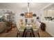 Dining room with contemporary decor, modern flooring, view into kitchen and neutral colors at 1323 Perico Point Cir # 107, Bradenton, FL 34209