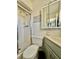 Bathroom featuring shower, toilet, and vanity, plus a framed picture on the wall at 1633 Leisure Dr # M-37, Bradenton, FL 34207