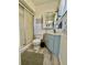Clean, modern bathroom with a glass-enclosed shower, stylish vanity, and neutral color scheme at 1633 Leisure Dr # M-37, Bradenton, FL 34207