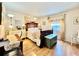 This bedroom features wood flooring, natural light, and vintage-style decor at 1633 Leisure Dr # M-37, Bradenton, FL 34207