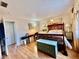 This spacious bedroom features hardwood flooring and a closet at 1633 Leisure Dr # M-37, Bradenton, FL 34207