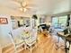 Open dining area with seating for four, natural light, and a view of the living room at 1633 Leisure Dr # M-37, Bradenton, FL 34207