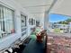 Comfortable porch features outdoor seating and pleasant view at 1633 Leisure Dr # M-37, Bradenton, FL 34207