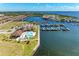 Aerial shot shows the clubhouse with community pool and the marina in this beautiful neighborhood at 1709 6Th E St, Palmetto, FL 34221