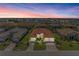 Stunning waterfront home with a tile roof and two-car garage on a lush, landscaped lot at 1709 6Th E St, Palmetto, FL 34221