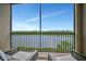 Enjoy picturesque water views from this inviting balcony with comfortable outdoor seating at 17626 Gawthrop Dr # 305, Bradenton, FL 34211