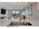 Bright kitchen with stainless steel appliances and light wood floors at 17626 Gawthrop Dr # 305, Bradenton, FL 34211