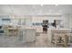 Spacious kitchen with stainless steel appliances, backsplash, and an eat-in area at 17626 Gawthrop Dr # 305, Bradenton, FL 34211