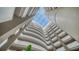Bright atrium with a skylight, offering a view of the building's architecture at 1771 Ringling Blvd # 1212, Sarasota, FL 34236