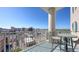 Enjoy city views from this condo's balcony, complete with seating and a modern railing at 1771 Ringling Blvd # 1212, Sarasota, FL 34236