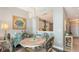 Cozy dining area adjacent to the kitchen with tasteful decor and natural light at 1771 Ringling Blvd # 1212, Sarasota, FL 34236