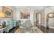 Open concept dining area with views into the kitchen and hallway at 1771 Ringling Blvd # 1212, Sarasota, FL 34236