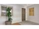 Hallway showing a view of the entrance door to one of the condos at 1771 Ringling Blvd # 1212, Sarasota, FL 34236