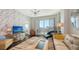 Cozy living room with a modern design, large windows, and city views at 1771 Ringling Blvd # 1212, Sarasota, FL 34236