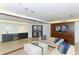 Community lounge featuring comfortable couches, refreshment area, and stylish decor at 1771 Ringling Blvd # 1212, Sarasota, FL 34236