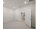 Minimalist bedroom with ample natural light and ensuite bathroom at 17966 Grand Prosperity Dr, Venice, FL 34293