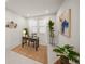 Bright home office with a desk, decorative wall art, and large window at 17966 Grand Prosperity Dr, Venice, FL 34293