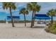 Beach cabanas offer shade and seating areas on the beautiful sandy beach at 1912 Harbourside Dr # 602, Longboat Key, FL 34228
