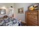 Bedroom with a dresser and a coastal decor at 1912 Harbourside Dr # 602, Longboat Key, FL 34228