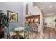 Bright dining area with a glass table, stylish chairs, and access to the kitchen at 1912 Harbourside Dr # 602, Longboat Key, FL 34228