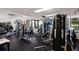 Bright gym with a variety of exercise equipment including treadmills, weights, and machines at 1912 Harbourside Dr # 602, Longboat Key, FL 34228