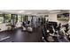 Bright gym with weights, stationary bikes, a TV, and state of the art workout equipment at 1912 Harbourside Dr # 602, Longboat Key, FL 34228