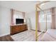 Bedroom featuring a modern canopy bed, hardwood floor, and light accents at 2001 25Th W Ave, Bradenton, FL 34205
