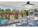 Enjoy outdoor living in the screened lanai overlooking the backyard at 2001 25Th W Ave, Bradenton, FL 34205