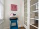 Bright bathroom features a blue side table and decorative wall art at 2003 12Th W Ave, Bradenton, FL 34205