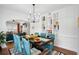 Open-concept dining room with built-in storage, stylish furniture, and an inviting atmosphere at 2003 12Th W Ave, Bradenton, FL 34205