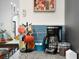Bright kitchen featuring granite countertops, blue backsplash, coffee maker, and colorful mug rack at 2003 12Th W Ave, Bradenton, FL 34205