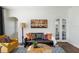 Bright living room with ceiling fan, lots of natural light, stylish furniture and decor at 2003 12Th W Ave, Bradenton, FL 34205