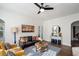 Bright living room with ceiling fan, lots of natural light, stylish furniture and decor at 2003 12Th W Ave, Bradenton, FL 34205