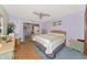 Comfortable bedroom with a ceiling fan, and calming decor and furniture at 2070 59Th St, Sarasota, FL 34243