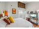 Comfortable bedroom with wood floors, decorative accents, and ample closet space at 2224 Bahia Vista St # E6, Sarasota, FL 34239