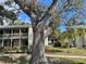 Well-maintained condo building with manicured lawn and beautiful mature tree in a desirable community at 2224 Bahia Vista St # E6, Sarasota, FL 34239