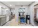 Bright kitchen area featuring stainless steel appliances and a beverage station at 2224 Bahia Vista St # E6, Sarasota, FL 34239