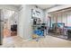 Bright kitchen area leading to a patio, featuring a beverage station at 2224 Bahia Vista St # E6, Sarasota, FL 34239