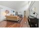 Bright living room features wood floors, vaulted ceilings, and modern furnishings at 2224 Bahia Vista St # E6, Sarasota, FL 34239